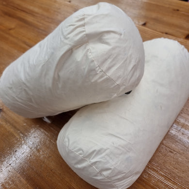 Feather bolster cushion pad in an ivory cream colour 