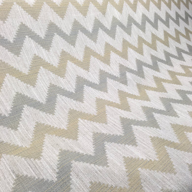 zig zag fabric with a musard and blue colour on a neutraul background