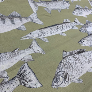 fish cotton curtain fabric with a moss green background colour